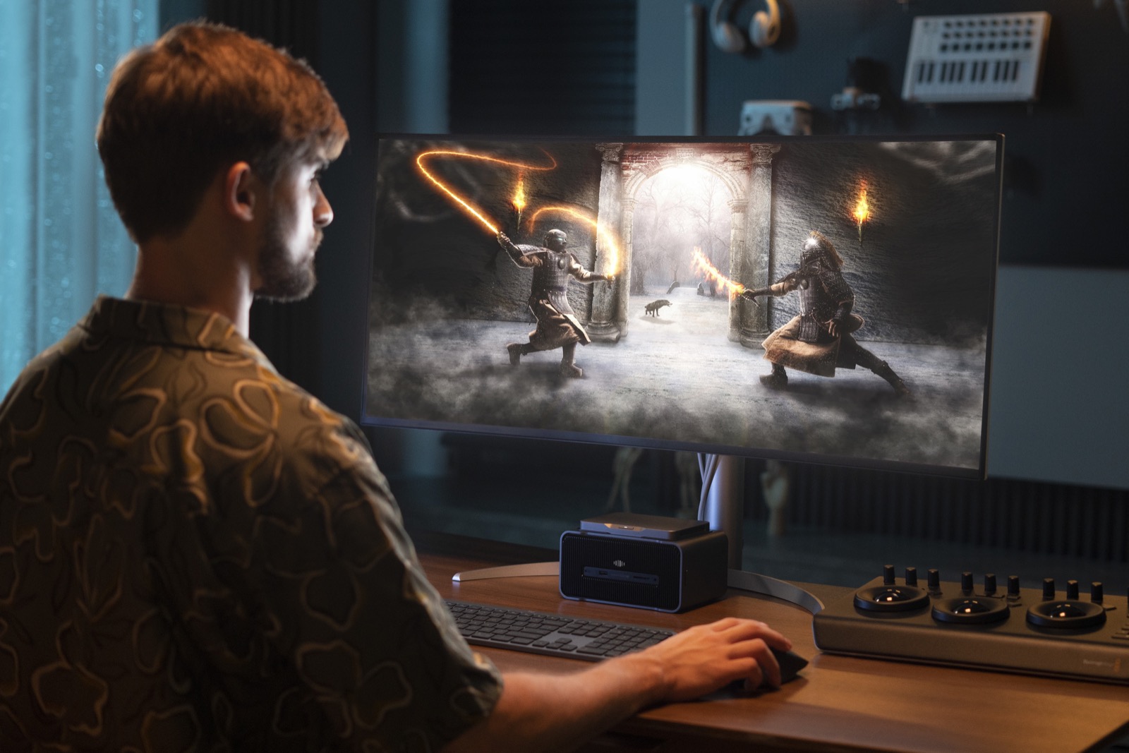 Mind with the Graphics dock powering a game in a dark studio